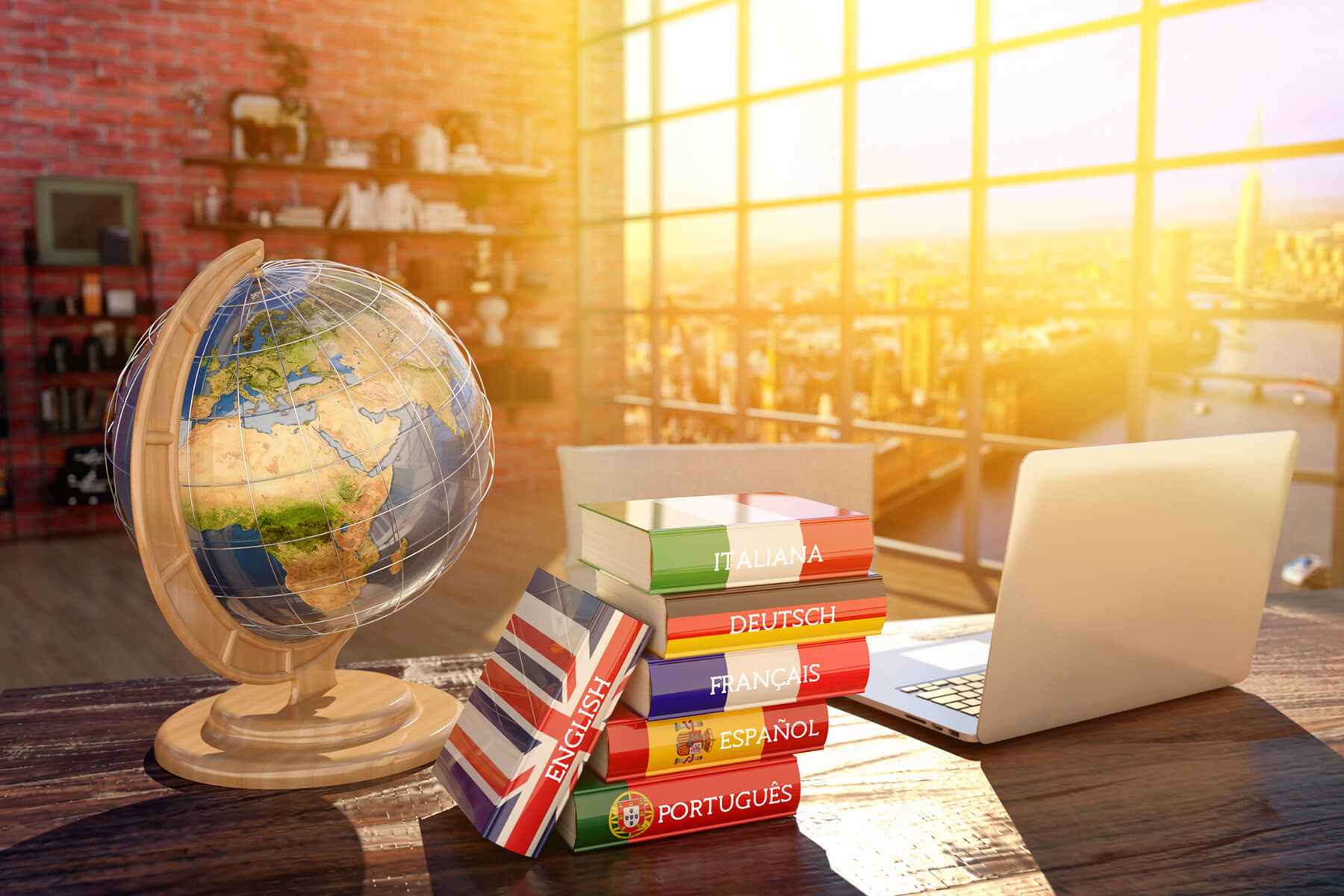 Table with books, a globe and a laptop on the top